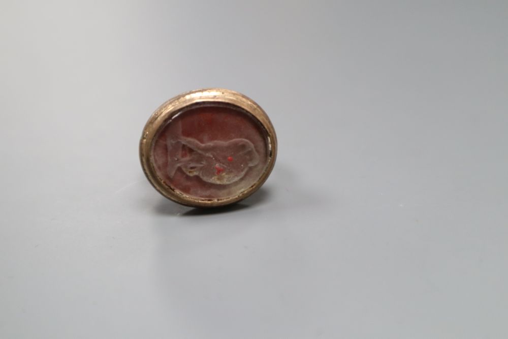 A 19th century yellow metal intaglio seal ring